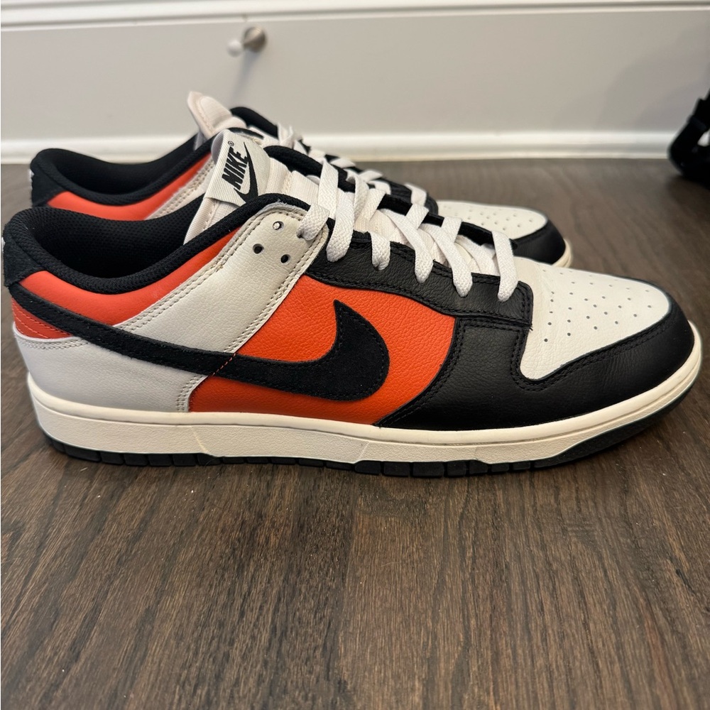 Nike Dunk Low Retro sneakers in the "Phantom/Black-Vintage Coral